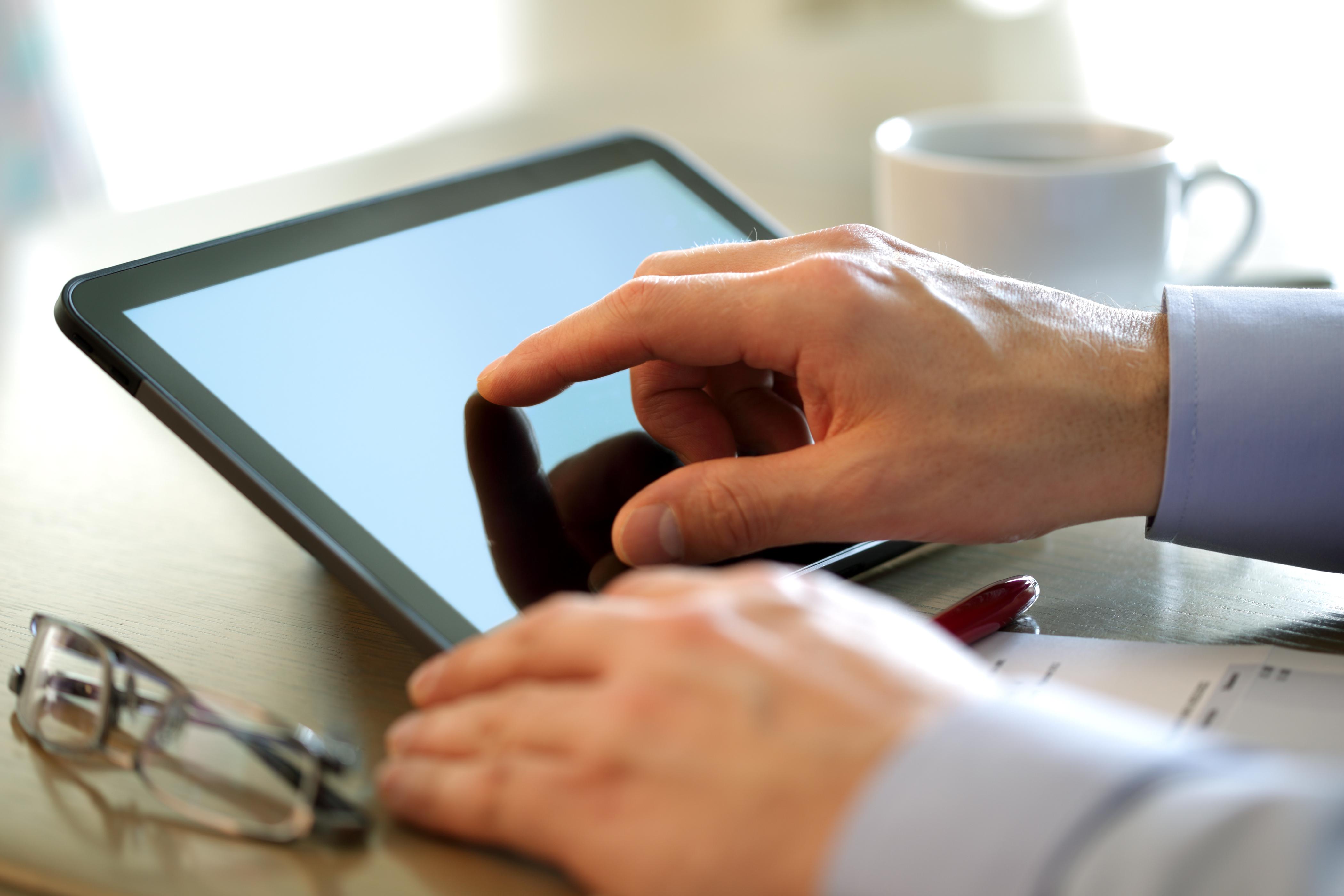 Businessman using a tablet